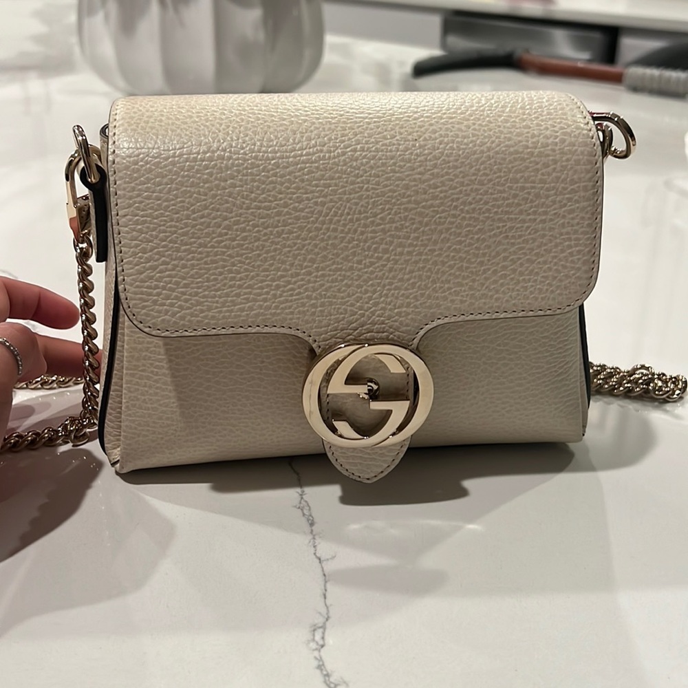 Gucci ivory interlocking monogram crossbody shoulder bag
